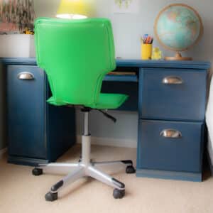blue chalk painted dresser with green chair.