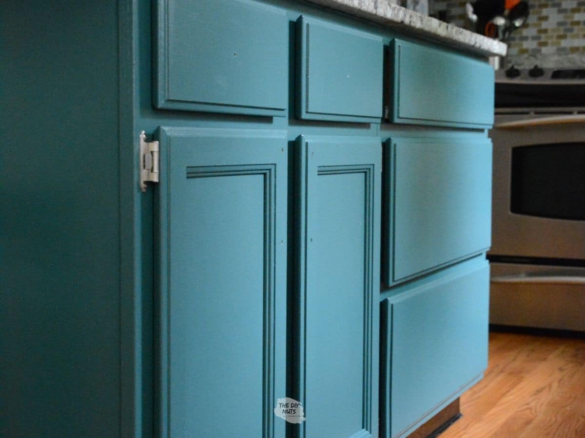green painted kitchen cabinets.
